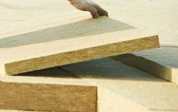 measuring Howe Street tapered insulation